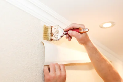 Pose de papier peint à Quiestède — revêtements muraux et toiles de verre